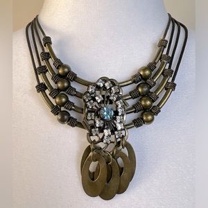 DANNIJO Oxidized Metal Statement Bib Necklace with Blue Stones and Crystals